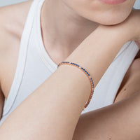 Rosy Tennis Bracelet With Blue And White Zircons Cm. 18